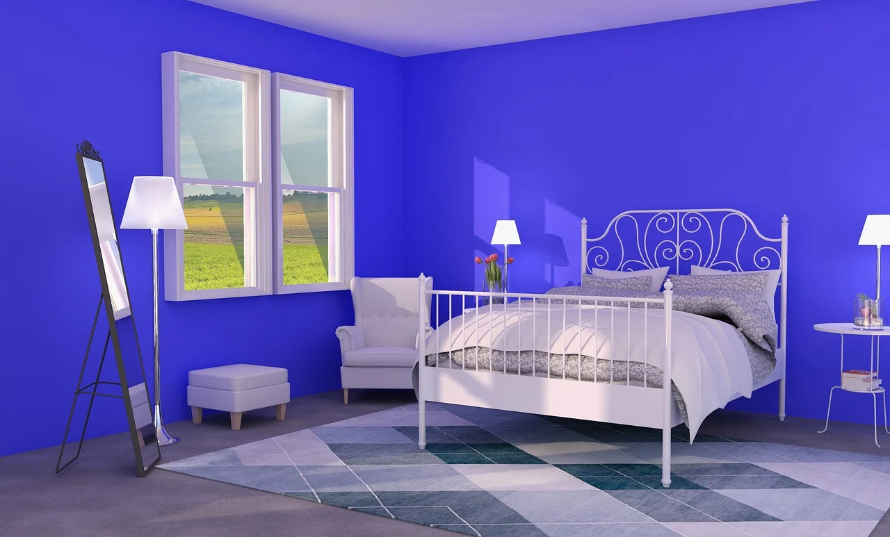 bedroom with blue wall color
