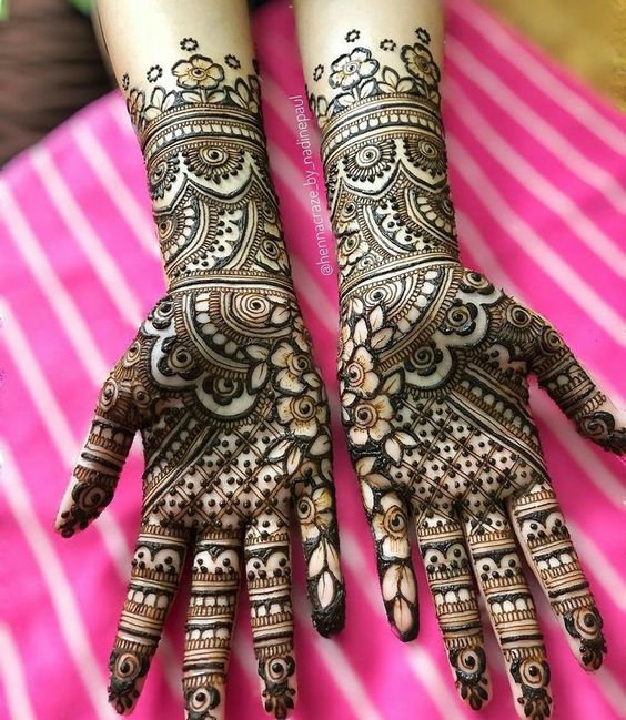 18. Modern full hand bridal Mehndi design