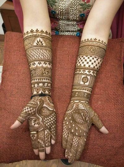 17. Traditional full hand bridal Mehndi design